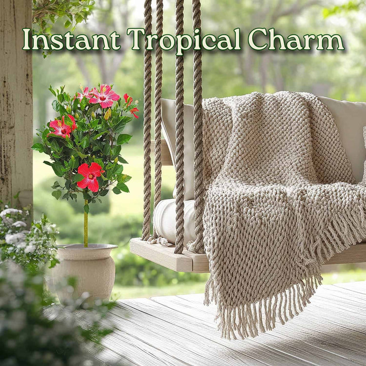 Tropical charm with a swing, blanket, and potted plant on a wooden deck.  #trunk_standard